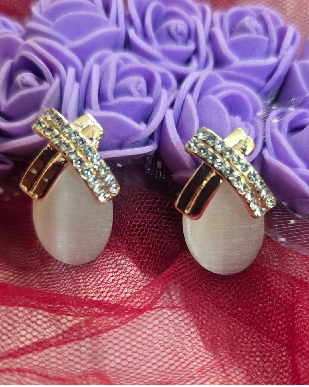 Ivory Elegance Zirconia Bow Drop Earrings